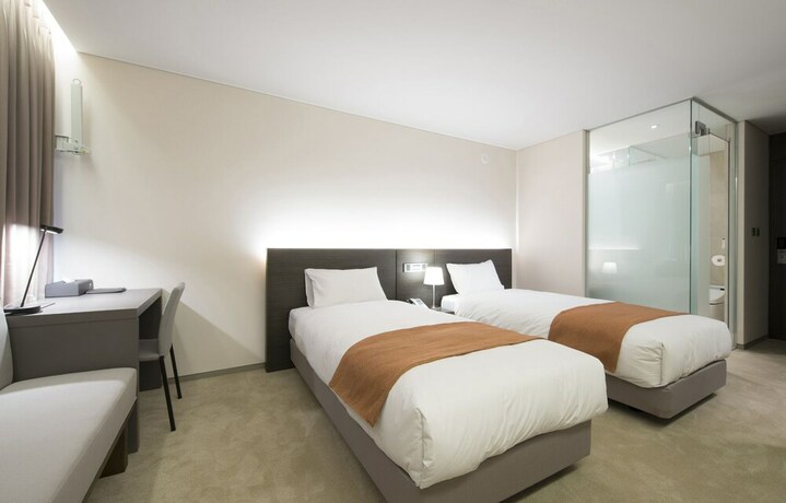 Imagen de la habitación del Hotel Grand Mer Jeju. Foto 32
