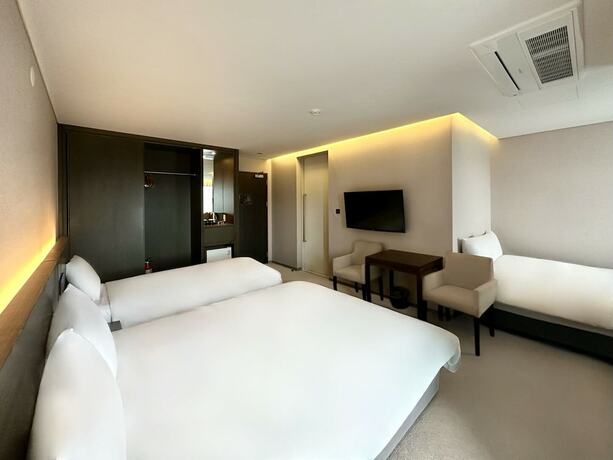 Imagen de la habitación del Hotel Grand Mer Jeju. Foto 33