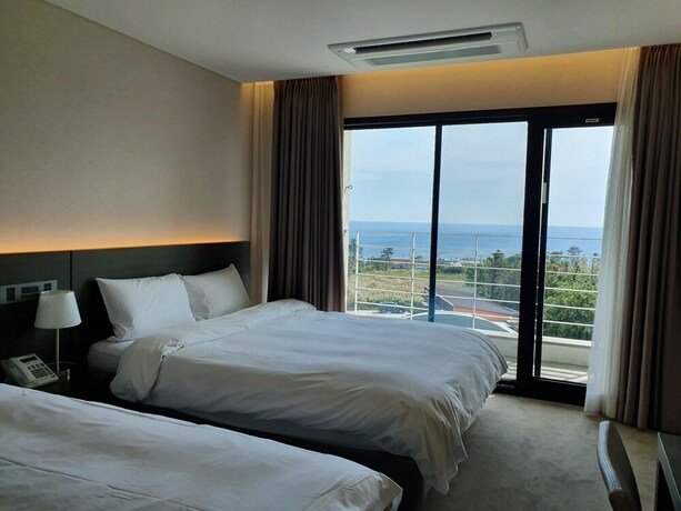 Imagen de la habitación del Hotel Grand Mer Jeju. Foto 34
