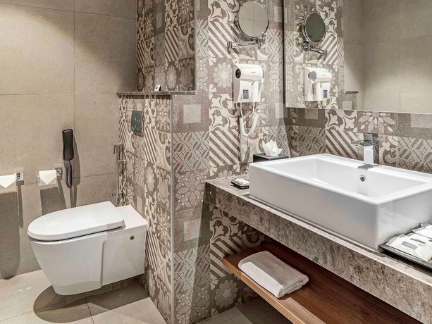 Imagen de la habitación del Hotel Grand Mercure Ahmedabad GIFT City. Foto 10