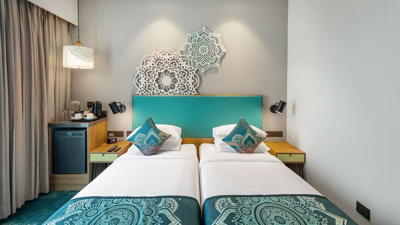 Imagen de la habitación del Hotel Grand Mercure Ahmedabad GIFT City. Foto 11