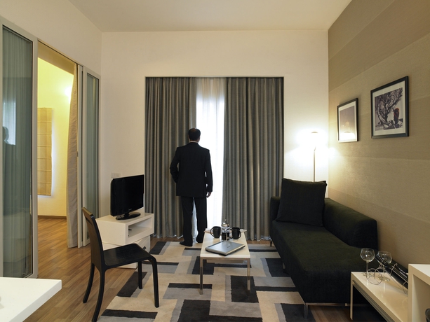 Imagen de la habitación del Hotel Grand Mercure Bangalore. Foto 5