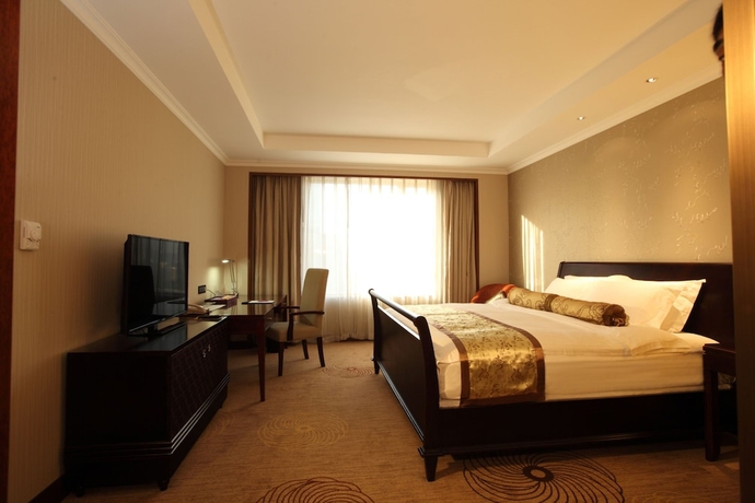 Imagen de la habitación del Hotel Grand Mercure Beijing Central. Foto 3