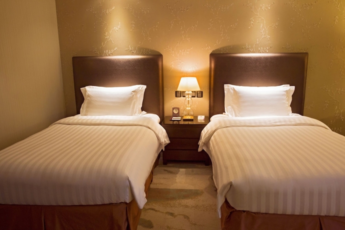 Imagen de la habitación del Hotel Grand Mercure Beijing Central. Foto 4