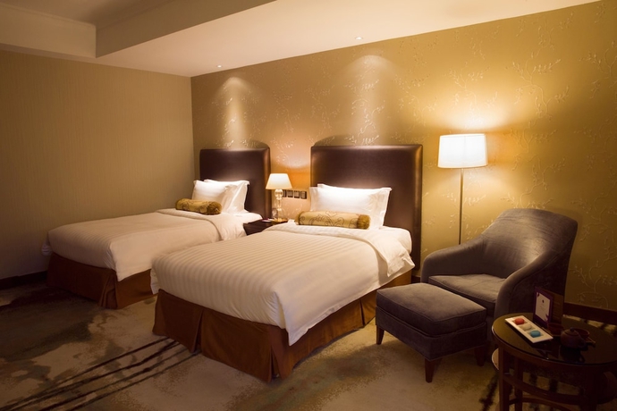 Imagen de la habitación del Hotel Grand Mercure Beijing Central. Foto 5