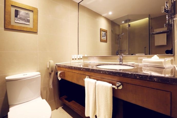 Imagen de la habitación del Hotel Grand Mercure Beijing Central. Foto 9