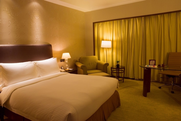Imagen de la habitación del Hotel Grand Mercure Beijing Central. Foto 11