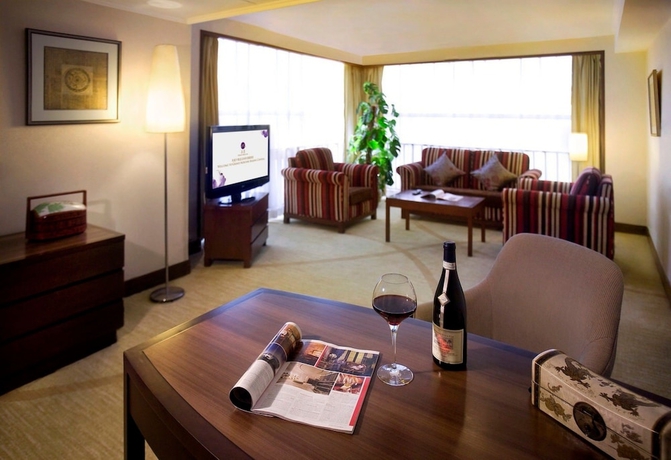 Imagen de la habitación del Hotel Grand Mercure Beijing Central. Foto 12