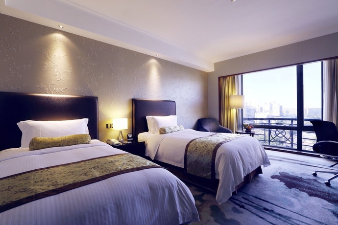 Imagen de la habitación del Hotel Grand Mercure Beijing Central. Foto 17