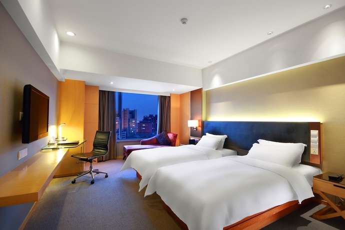 Imagen de la habitación del Hotel Grand Mercure Dongguan Humen. Foto 6