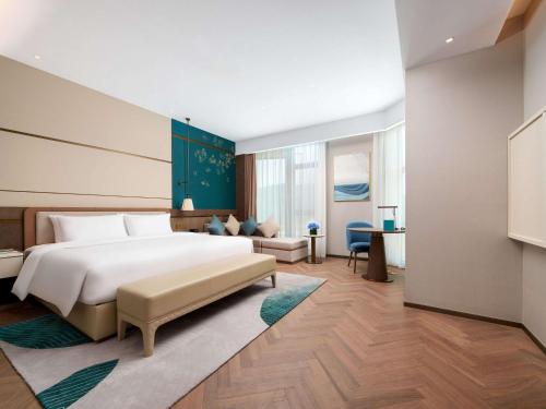 Imagen de la habitación del Hotel Grand Mercure Hangzhou Qingshan Lake. Foto 14