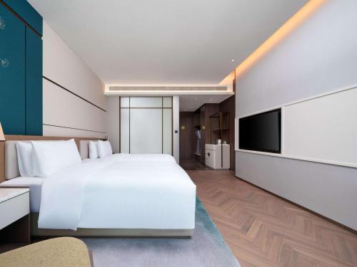 Imagen de la habitación del Hotel Grand Mercure Hangzhou Qingshan Lake. Foto 20