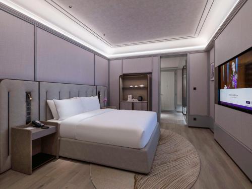 Imagen de la habitación del Hotel Grand Mercure Hangzhou Zhejiang University. Foto 16
