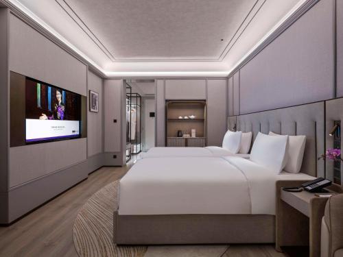 Imagen de la habitación del Hotel Grand Mercure Hangzhou Zhejiang University. Foto 17