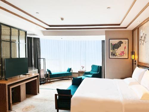 Imagen de la habitación del Hotel Grand Mercure Kunming South. Foto 8