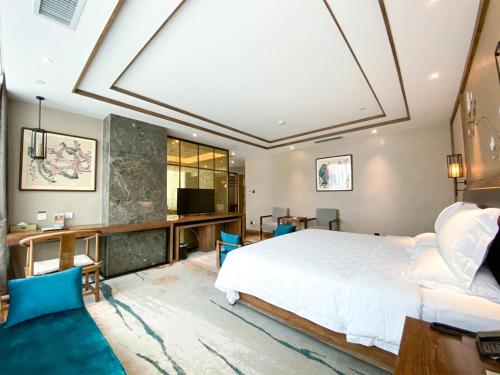 Imagen de la habitación del Hotel Grand Mercure Kunming South. Foto 11