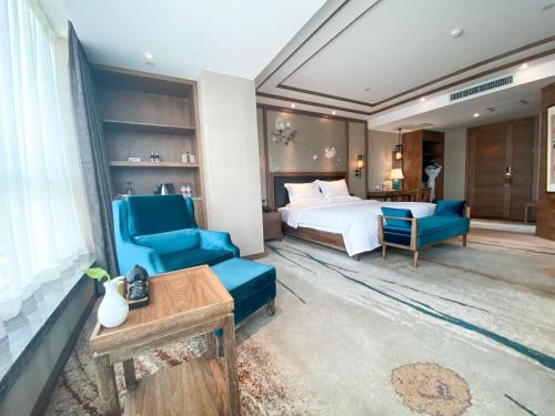 Imagen de la habitación del Hotel Grand Mercure Kunming South. Foto 12
