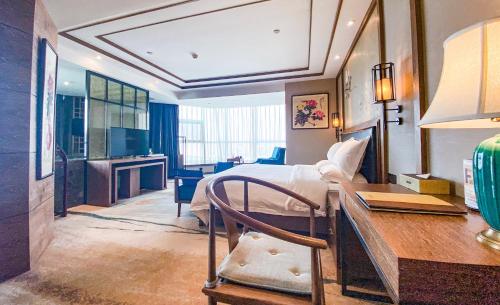 Imagen de la habitación del Hotel Grand Mercure Kunming South. Foto 14