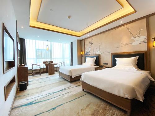 Imagen de la habitación del Hotel Grand Mercure Kunming South. Foto 15
