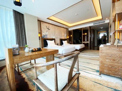 Imagen de la habitación del Hotel Grand Mercure Kunming South. Foto 18