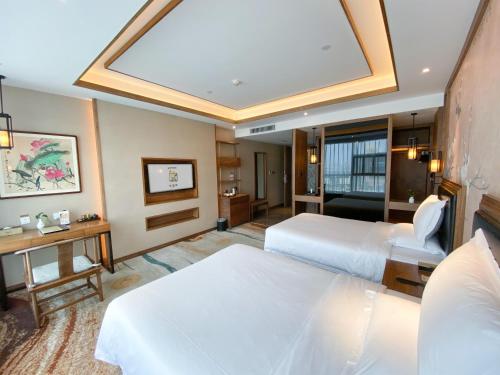 Imagen de la habitación del Hotel Grand Mercure Kunming South. Foto 19