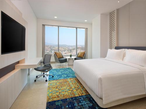 Imagen de la habitación del Hotel Grand Mercure Lampung. Foto 13