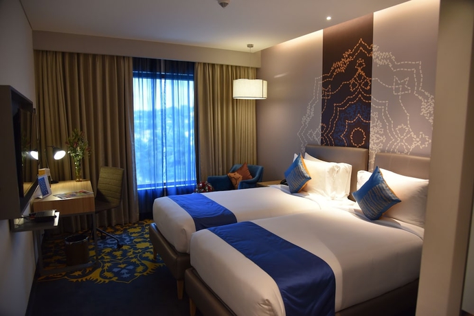 Imagen de la habitación del Hotel Grand Mercure Mysore. Foto 7