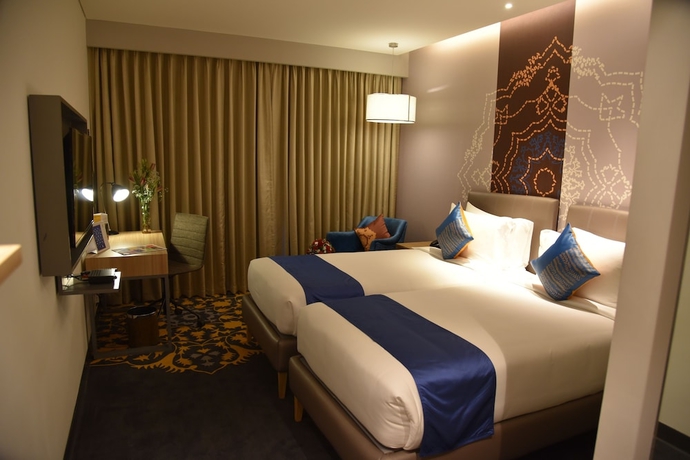 Imagen de la habitación del Hotel Grand Mercure Mysore. Foto 15