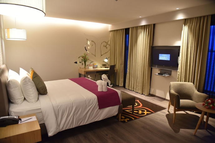 Imagen de la habitación del Hotel Grand Mercure Mysore. Foto 17