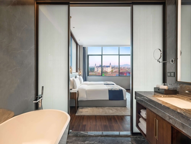 Imagen de la habitación del Hotel Grand Mercure Pingxiang Kaiguang. Foto 8