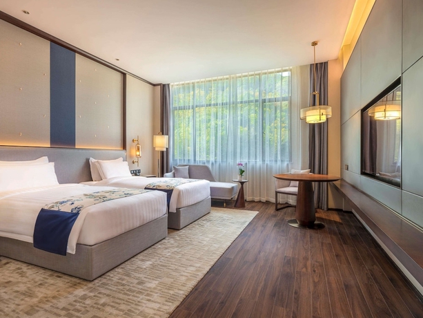 Imagen de la habitación del Hotel Grand Mercure Pingxiang Kaiguang. Foto 11