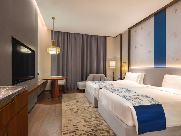 Imagen de la habitación del Hotel Grand Mercure Pingxiang Kaiguang. Foto 12