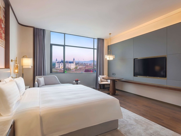 Imagen de la habitación del Hotel Grand Mercure Pingxiang Kaiguang. Foto 14