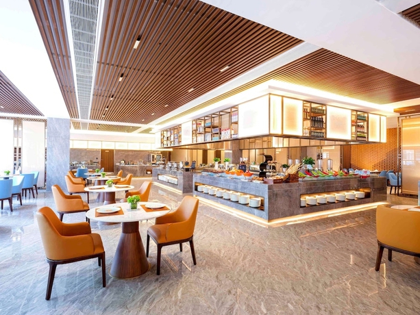 Imagen del bar/restaurante del Hotel Grand Mercure Pingxiang Kaiguang. Foto 2