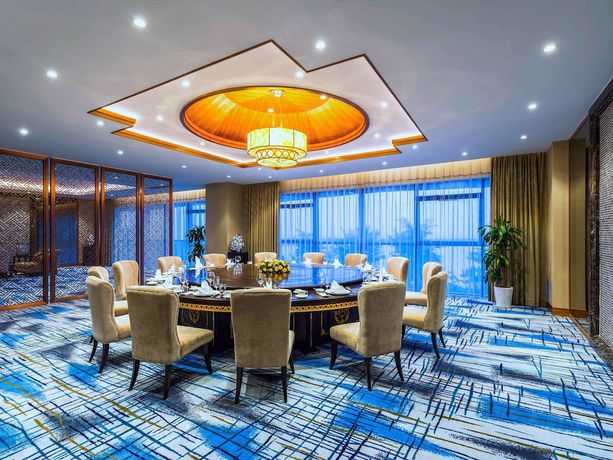 Imagen del bar/restaurante del Hotel Grand Mercure Qingdao Airlines. Foto 6