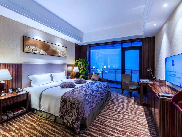 Imagen de la habitación del Hotel Grand Mercure Qingdao Airlines. Foto 8