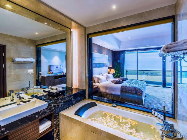 Imagen de la habitación del Hotel Grand Mercure Qingdao Airlines. Foto 11