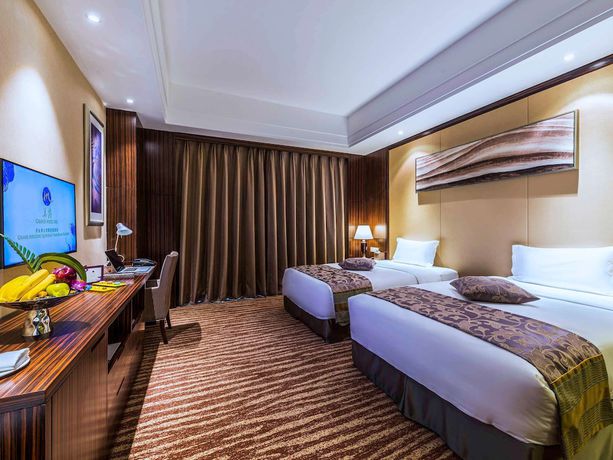 Imagen de la habitación del Hotel Grand Mercure Qingdao Airlines. Foto 12