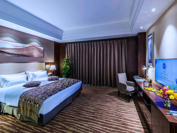 Imagen de la habitación del Hotel Grand Mercure Qingdao Airlines. Foto 15