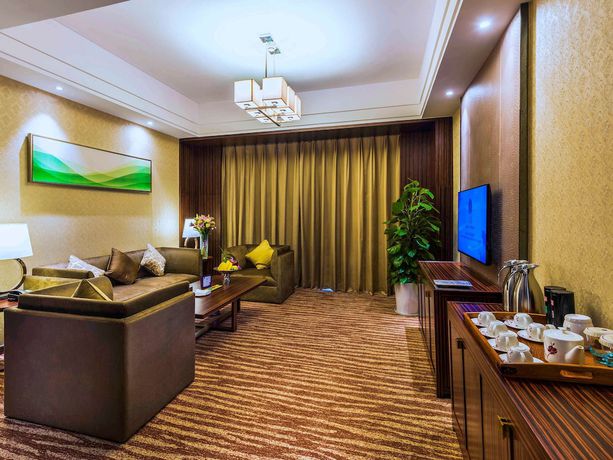 Imagen de la habitación del Hotel Grand Mercure Qingdao Airlines. Foto 16