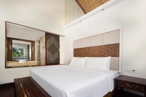 Imagen de la habitación del Hotel Grand Mercure Sanya Yalong Bay. Foto 15