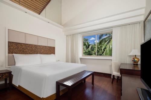 Imagen de la habitación del Hotel Grand Mercure Sanya Yalong Bay. Foto 16