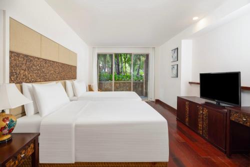 Imagen de la habitación del Hotel Grand Mercure Sanya Yalong Bay. Foto 18