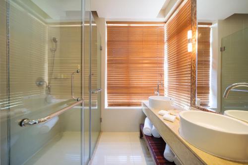 Imagen de la habitación del Hotel Grand Mercure Sanya Yalong Bay. Foto 20