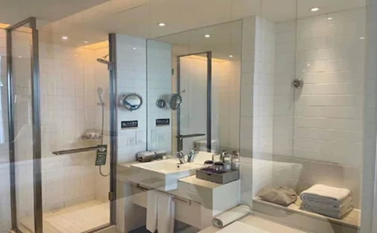 Imagen de la habitación del Hotel Grand Mercure Shanghai Century Park. Foto 11