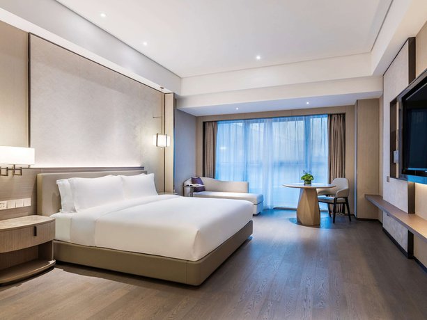 Imagen de la habitación del Hotel Grand Mercure Shanghai Lingang. Foto 6