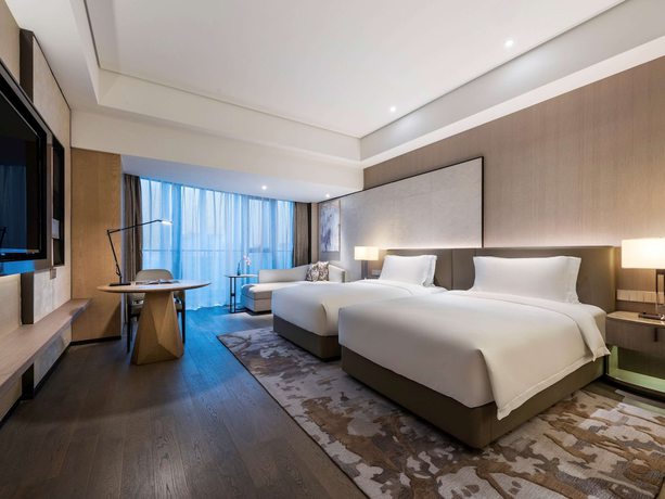 Imagen de la habitación del Hotel Grand Mercure Shanghai Lingang. Foto 13