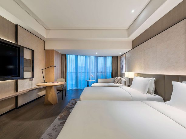 Imagen de la habitación del Hotel Grand Mercure Shanghai Lingang. Foto 15