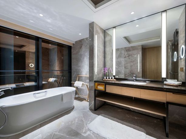Imagen de la habitación del Hotel Grand Mercure Shanghai Lingang. Foto 18