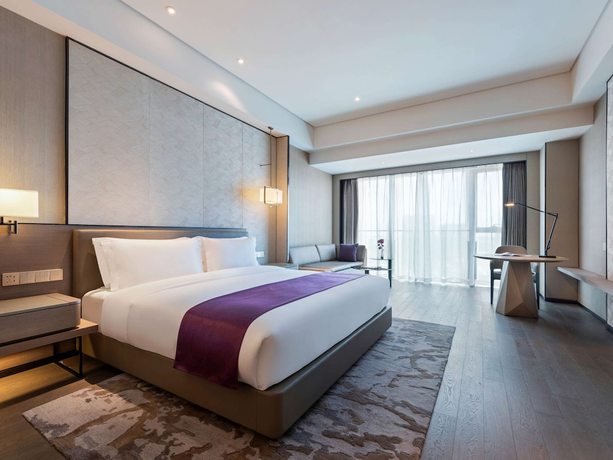 Imagen de la habitación del Hotel Grand Mercure Shanghai Lingang. Foto 19